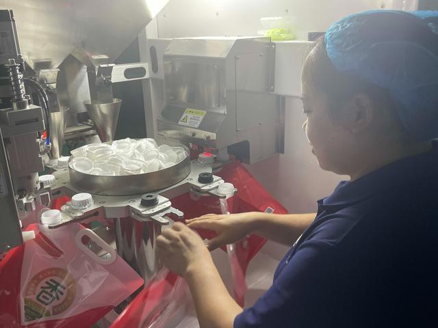 节日稻谷加工忙产销链上米飘香